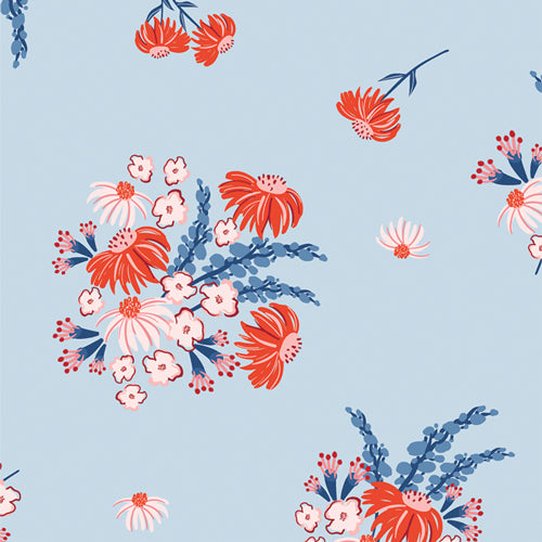Floral pattern with red, pink, and blue flowers on a light blue background